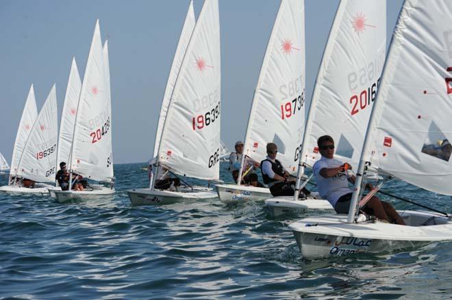 Boys fleet in action - 2013 Laser Radial Youth World Championships © Oman Sail
